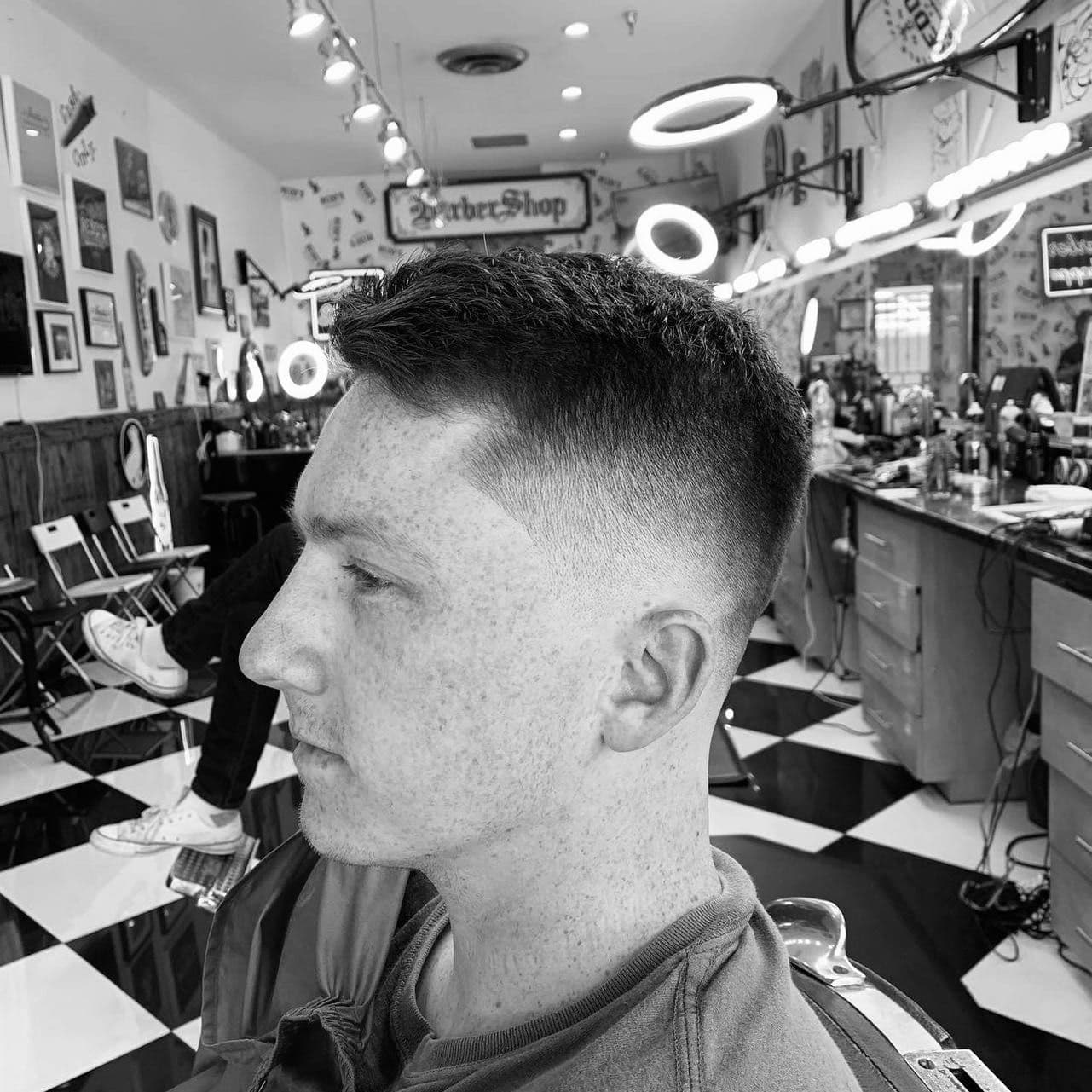Mid skin fade comb over
